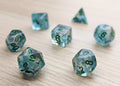 Cyberspace Polyhedral Dice Set - Semi Opaque with Blue and Black Swirls and glitter