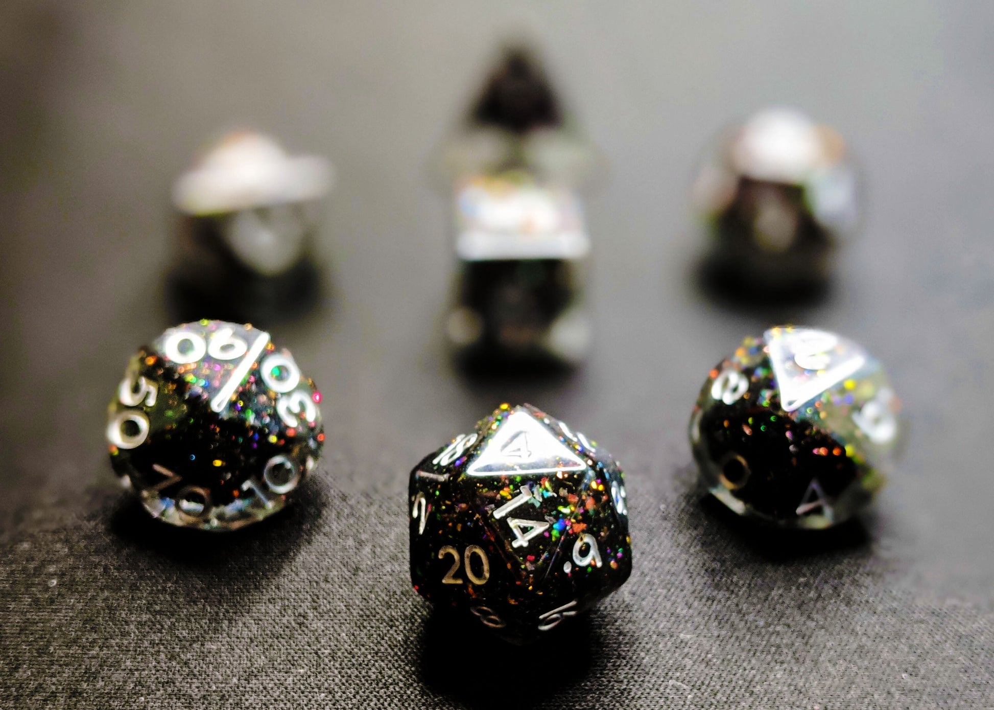 Dark Magic Polyhedral Dice Set - Clear with Dense Core of Black Rainbow Glitter