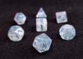 Chaos Blue Polyhedral Dice Set - White Semi Translucent Dice with Micro Glitter and Blue Numbers