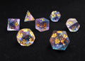 Scattered Stars Polyhedral Dice Set - Translucent Blue and Pink Sharp Edge Dice with Gold Flake and Gold Numbers