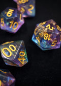 Scattered Stars Polyhedral Dice Set - Translucent Blue and Pink Sharp Edge Dice with Gold Flake and Gold Numbers