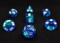 Meteor Storm Polyhedral Dice Set - Green and Blue Translucent Swirl Dice with Reflect Micro Glitter and White Numbers