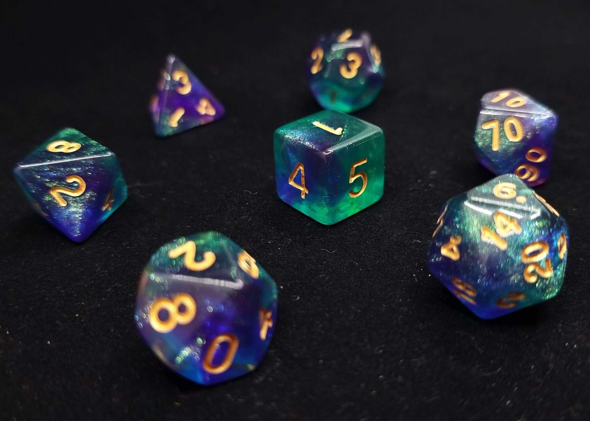 Sea of Stars Polyhedral Dice Set - Translucent Blue and Purple with Glitter