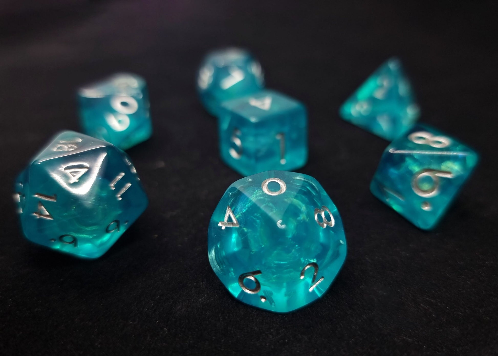 Reflection Pool Polyhedral Dice Set - Translucent Turquoise with Iridescent Foil Core