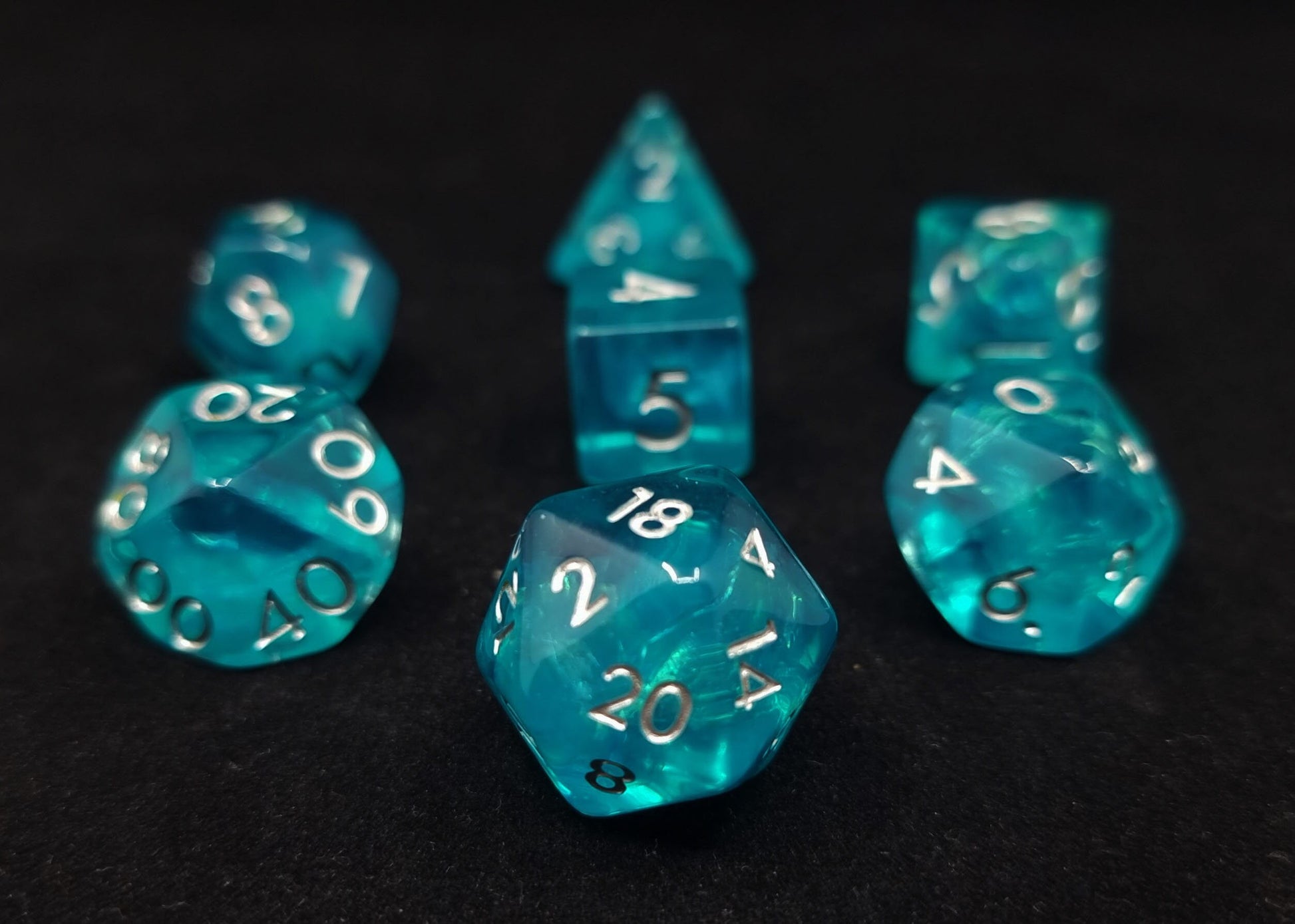 Reflection Pool Polyhedral Dice Set - Translucent Turquoise with Iridescent Foil Core