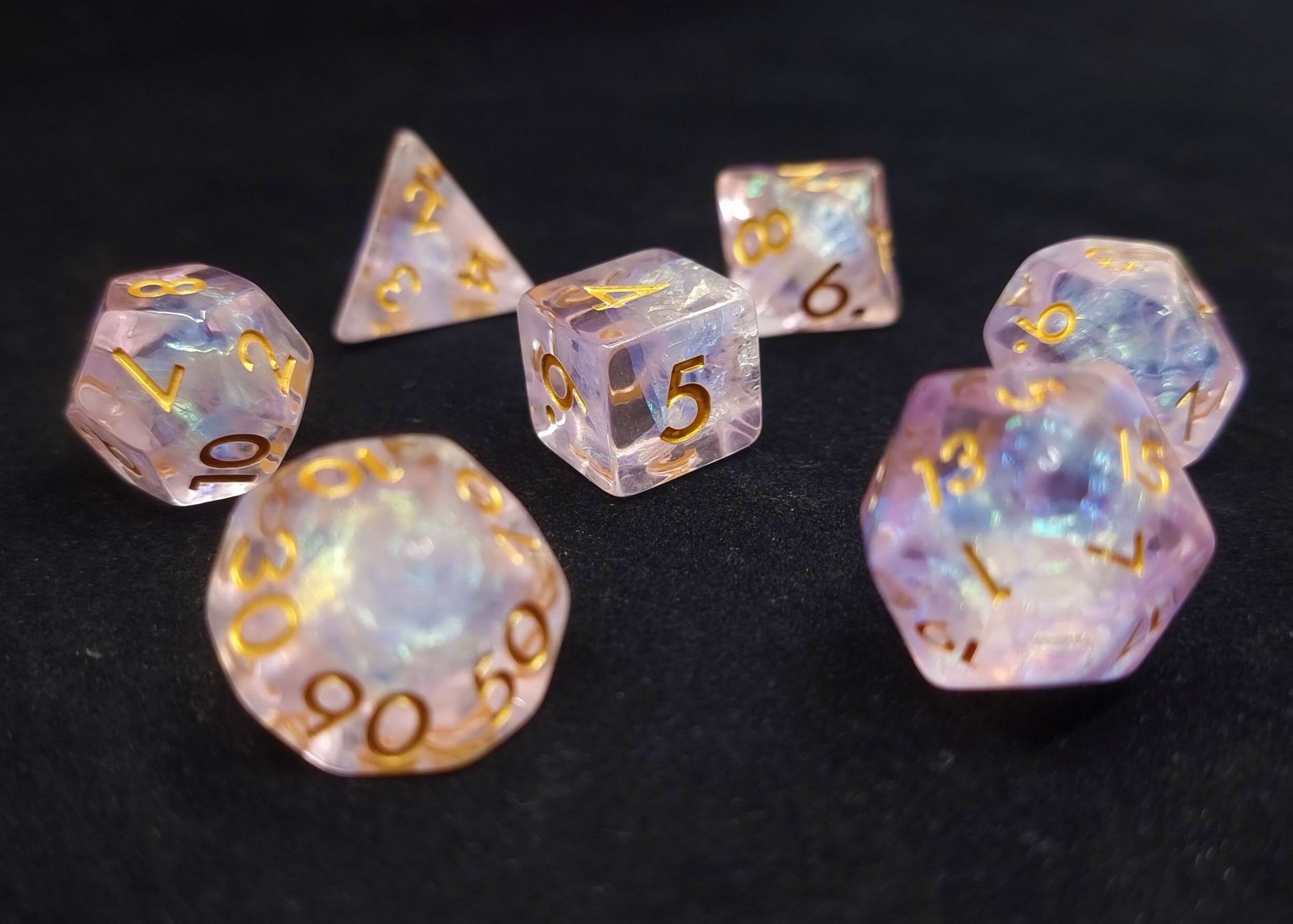 Glimmer of Hope Polyhedral Dice Set - Translucent Pale Pink Dice with Holographic Core and Gold Numbers